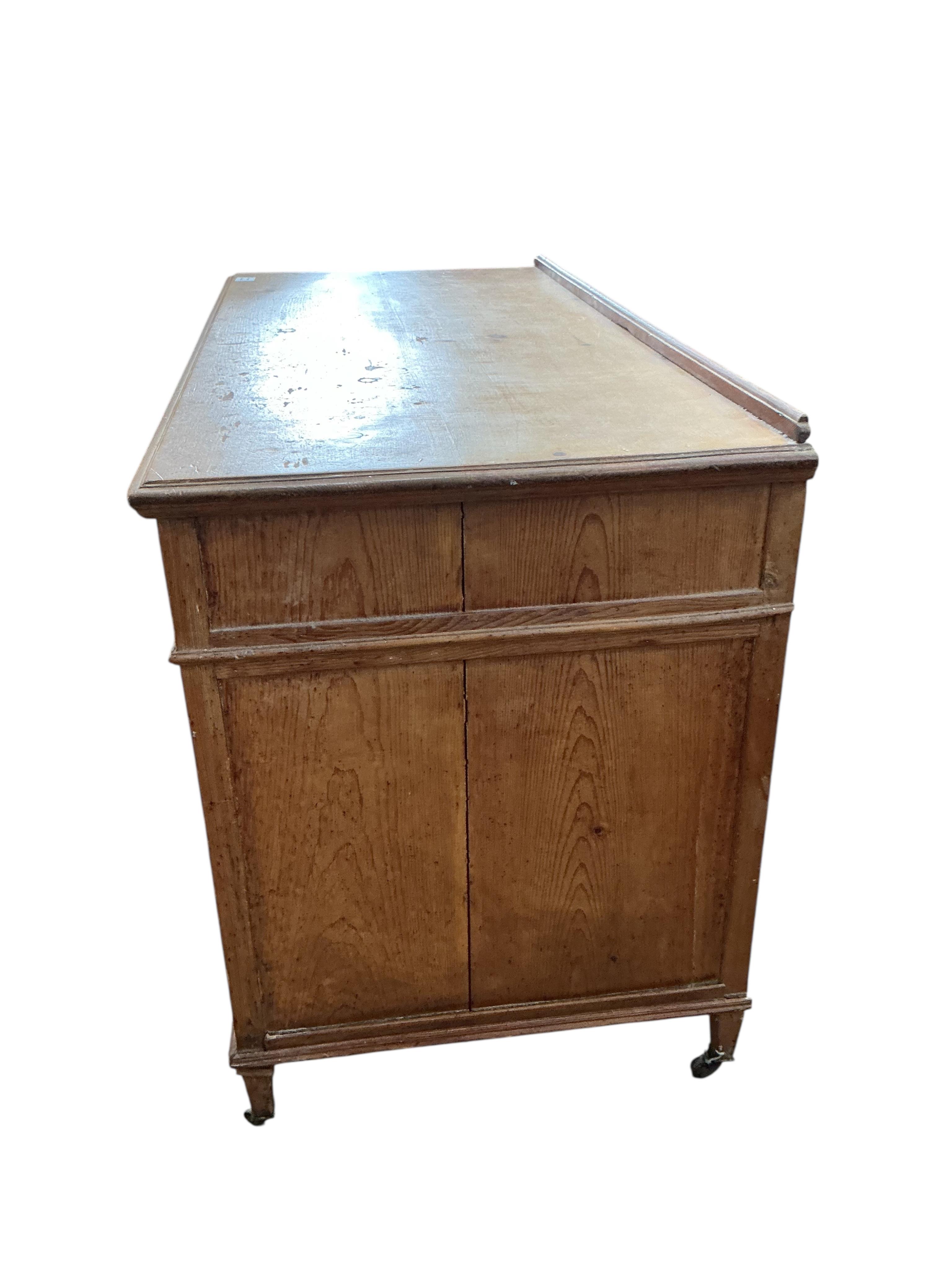 An early 20th century mahogany and pine pedestal desk, width 122cm, depth 56cm, height 78cm